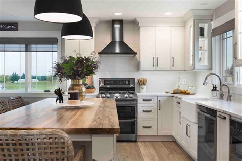 white cabinets black stainless steel appliances|black countertops with white cabinets.